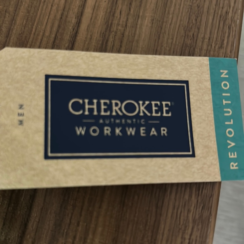Brand new in bag! Cherokee revolution drawstring cargo scrubs.